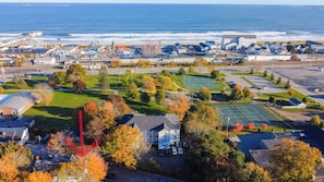 Explore Old Orchard Beach from an ideal location — just one street back from the excitement, yet peaceful and quiet. Enjoy a quick 5-minute stroll to the white sand beach, the iconic pier, and Palace Playland amusement park. Shops and dining nearby.