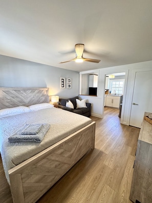 This comfortable suite features a queen-sized bed and a sofa with a twin pullout, making it perfect for couples, small families, or friends traveling together. Whether you're unwinding after a day at the beach or getting ready for a night out, you'll enjo