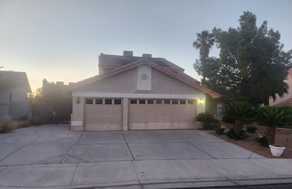 Exterior front of house. Large driveway has plenty of room to park your vehicle
