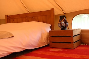 Each bedside table features battery-powered lights