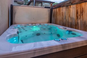 A true essential—soak your stress away in the inviting hot tub!
