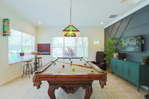 From friendly card nights to pool table showdowns, the game room is packed with fun for all ages. Enjoy a full poker setup, classic board games, and plenty of space to gather and play.