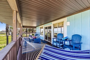 Ocean Front deck with Hammock,  outdoor dining and 4 high top bar stools