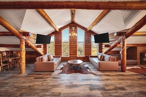 Upstairs living room with double TVs and couches. Perfect for Game day or Fantasy Draft Night