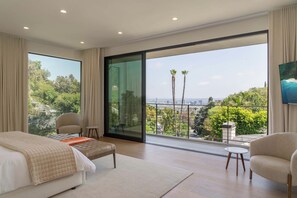 Luxurious, spacious master bedroom with large private terrace with amazing views