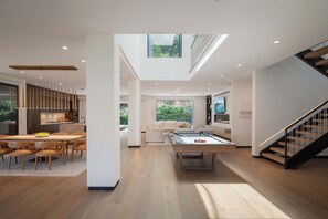 MAIN FLOOR: 2 bedroom, living room, gym, kitchen, bar, pool, jacuzzi, bbq