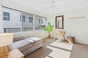 Relax or stay productive, this space offers both comfort and functionality.