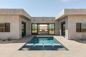Relax by the pool, there are two extra wide sun loungers adjacent to the spa.
