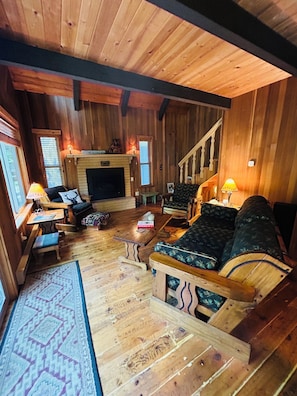 Cozy living room with sliding glass doors to deck