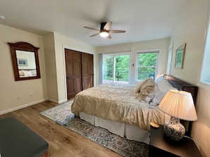 Master bedroom with king bed & full bath