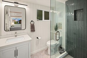 Elegant tile and vertical shiplap add charm and character