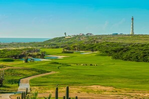 Endless greens and ocean blues—this is the Tierra del Sol Golf Course, with the iconic California Lighthouse in the distance. A breathtaking blend of nature, island charm, and championship golf.