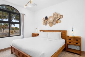 Welcome to Bedroom 2 of Mesa Vista 5—bright, peaceful, and thoughtfully designed with warm wood tones and a comfy king-size bed for a restful night after your island adventures.