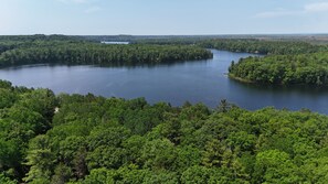 OVERALL:  The gorgeous Au Sable River behind the property.  (This is an aerial photo taken from above the cabin.)