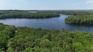 OVERALL: The gorgeous Au Sable River behind the property. (This is an aerial photo taken from above the cabin.)