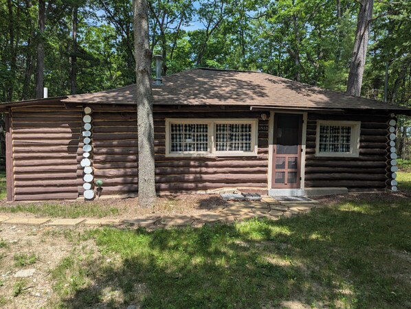 OVERALL:  The front of the cabin in summer.