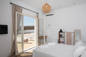 Bedroom interios, and access to the swimming pool area