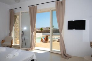 Interior view from patio – sliding doors bring in natural light and connect the space to the outdoors