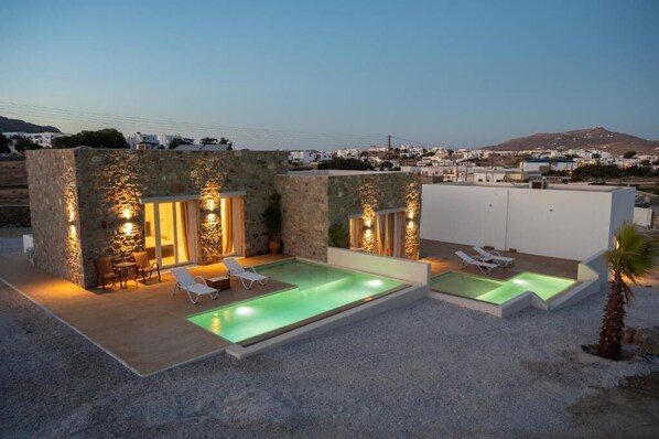 Evening by the private pool – ideal for a quiet swim or relaxing by the lit terrace
