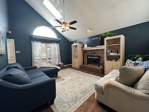 Living room with small TV- just enough for a movie night