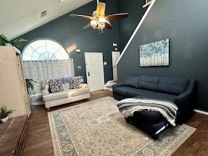 Spacious Living room; pull-out queen bed (1st floor)