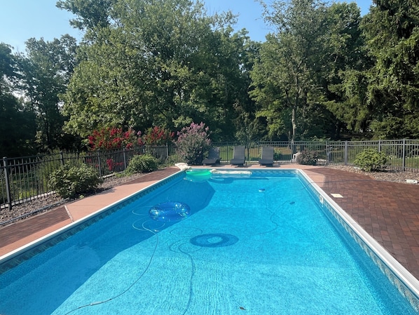 Pool 16x32' inground pool with lounge chairs and seating for the entire crew.