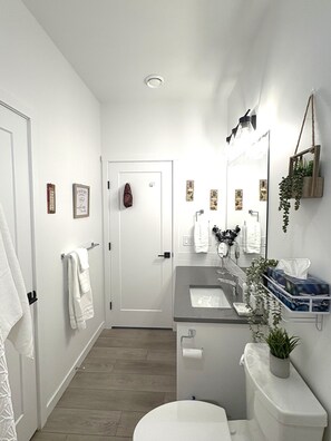 Start and end your day in a bright bathroom, fully stocked with essentials.