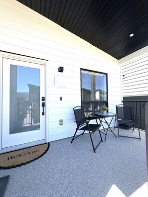 Our covered porch offers the perfect spot to enjoy your coffee and sunshine.