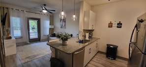 Open floor plan intertwined to engage and entertain with guests/visitors