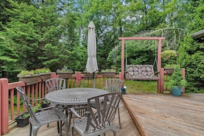 Spacious deck with grill and outdoor dining—perfect for cookouts and gatherings
