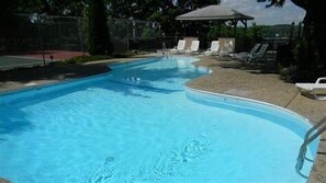 Cool off at the community pool, just steps from your lakefront condo — perfect for families and summer fun.