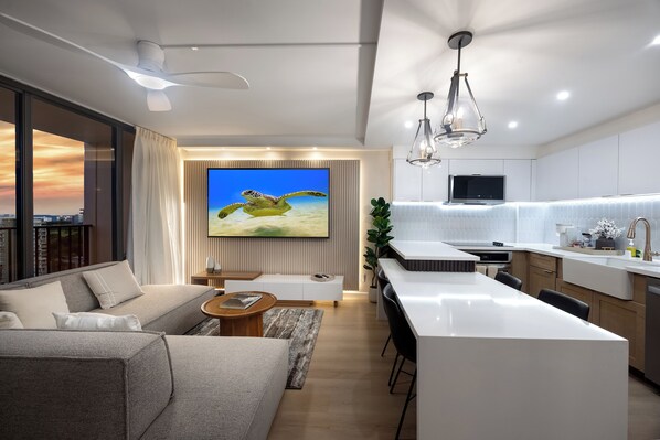 Welcome to this beautifully renovated space, where an open-concept living area and full kitchen invite you to relax and create delicious memories together! Relax after a long day at the beach and watch your favorite TV show with our 85" smart TV.