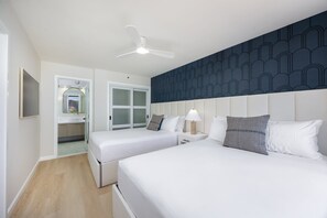 Get ready for restful nights in your cozy haven, featuring two comfy queen beds and a 55" smart TV perfect for unwinding after island adventures.