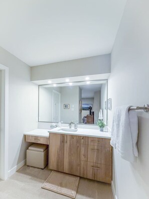Ensuite split bathroom design for convenience.