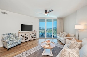 Enjoy beautiful beach waves & boats from inside your living room