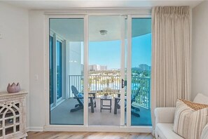 Living Room sliding doors is 1 of 2 ways to access your private balcony