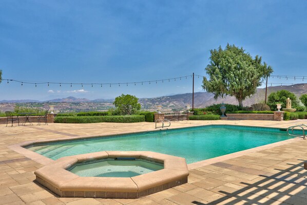 Scenic pool and spa area offers breathtaking views and a peaceful space to relax or entertain.