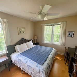 King bed, vanity desk, ensuite bathroom, corner windows & top floor privacy