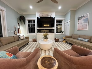 Comfortable Spacious Living Room For Entertainment with Mahi Tuna, Modern Fire Place, Roku TV