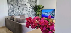 Indigo Bliss Villa is beautifully adorned with vibrant Caribbean decor, featuring colorful accents, natural textures, and stylish furnishings that capture the essence of the island's charm and warmth.