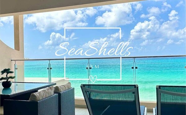 Savor your meals while enjoying the soothing sounds of the ocean from your private balcony, creating the perfect backdrop for a relaxing and memorable experience.