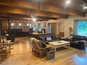 Living area, different seating options + wood stove for comfort and warmth