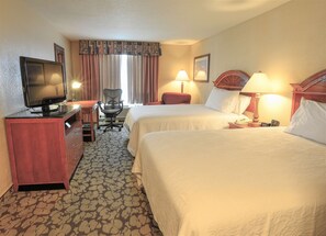 Unit with 2 Queen beds. Exact unit will be assigned upon arrival. Views, colors, and decor may vary.