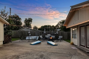 Patio area with seating and bbq grill