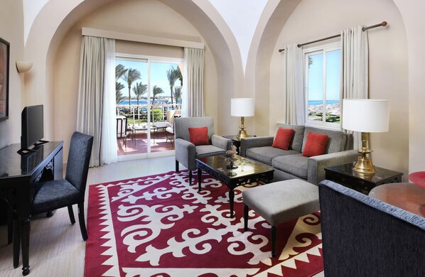 Living area. Exact unit will be assigned upon arrival. Views, colors, and decor may vary.