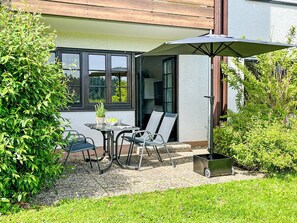 Furniture, Outdoor Furniture, Shrub, Chair, Garden, Umbrella, Outdoor Table, Shade, Door