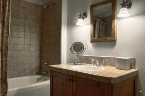 Tub and Shower in Bathroom | Listed with @BookTraverse