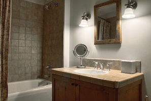 Tub and Shower in Bathroom | Listed with @BookTraverse