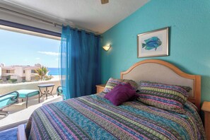 Wake up to ocean breezes in this inviting bedroom.