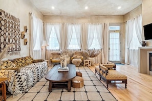 Warm Living Area with Smart TV and Plenty of Plush Seating